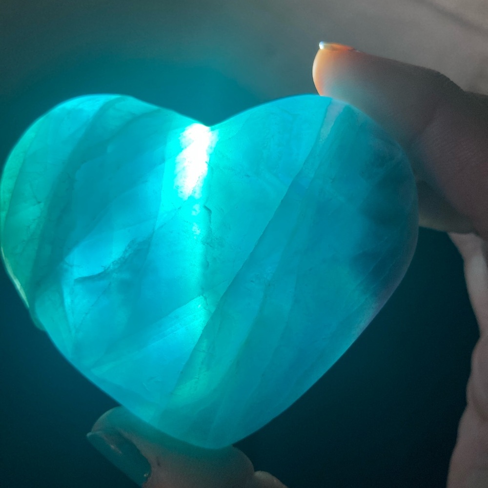 Beautiful glowing fluorite heart stone
